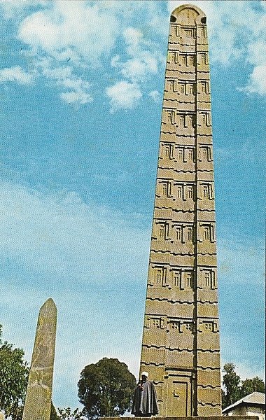 King Ezana's Stela is a 21 m (69 ft) obelisk in the ancient city of Axum, Ethiopia. The monument, which dates to the 4th century A.D., stands at the center of Northern Stelae Park with hundreds of smaller stelae. In 2007-08, the stela was structurally consolidated and today is braced to prevent further leaning. King Ezana's Stela is a 21 m (69 ft) obelisk in the ancient city of Axum, Ethiopia. The monument, which dates to the 4th century A.D., stands at the center of Northern Stelae Park with hundreds of smaller stelae. In 2007-08, the stela was structurally consolidated and today is braced to prevent further leaning.