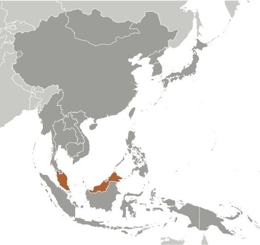 Malaysia: Southeastern Asia, peninsula bordering Thailand and northern one-third of the island of Borneo, bordering Indonesia, Brunei, and the South China Sea, south of Vietnam Malaysia: Southeastern Asia, peninsula bordering Thailand and northern one-third of the island of Borneo, bordering Indonesia, Brunei, and the South China Sea, south of Vietnam