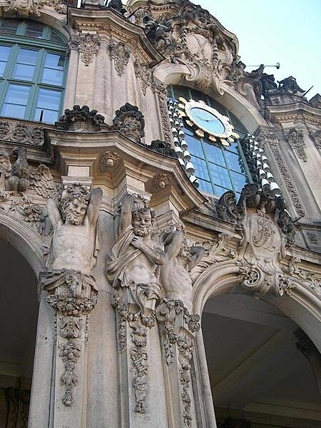Some sculpted highlights on the wall pavilion at the north end of the Zwinger Palace in Dresden, Germany Some sculpted highlights on the wall pavilion at the north end of the Zwinger Palace in Dresden, Germany