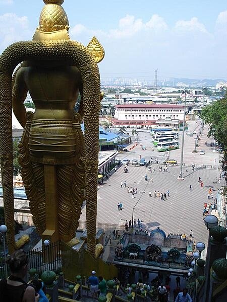 The statue of Lord Murugan, a Hindu deity, overlooks the plaza before the Batu Caves The statue of Lord Murugan, a Hindu deity, overlooks the plaza before the Batu Caves