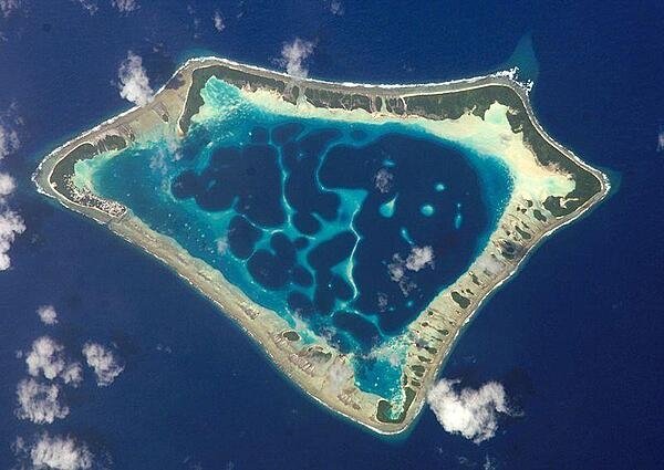 At roughly 8 km (5 mi) wide, Atafu Atoll is the smallest of three atolls comprising Tokelau At roughly 8 km (5 mi) wide, Atafu Atoll is the smallest of three atolls comprising Tokelau